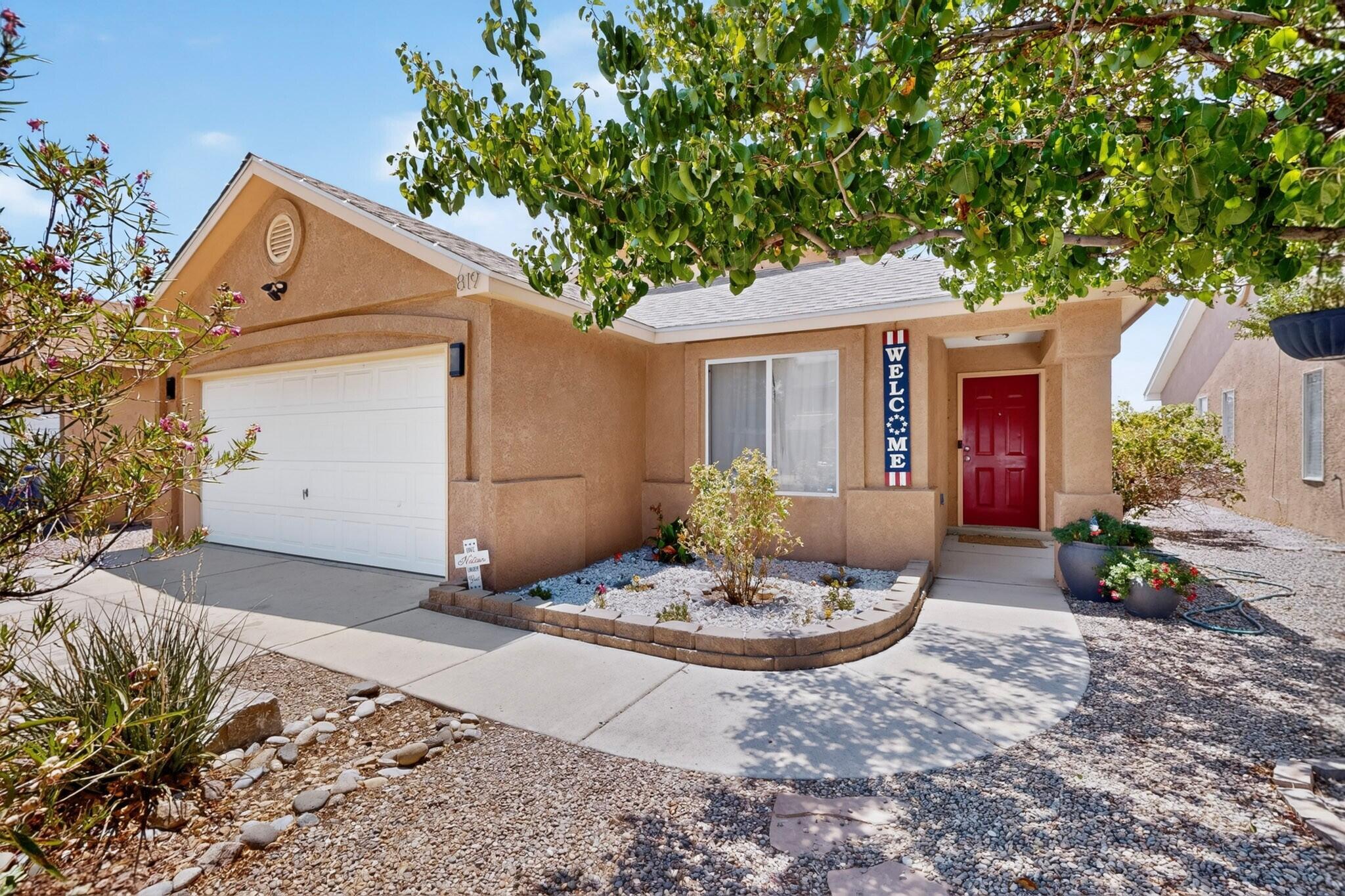 Welcome home to this beautifully maintained 3-bedroom, 2-bath home featuring an open floor plan, spacious living area with vaulted ceilings, and a bright kitchen with ample cabinet space. The private primary suite includes a walk-in closet and en-suite bath. Escape to your own backyard oasis with a custom covered patio featuring a beautiful wood ceiling, ceiling fan, and cafe lights. Mature shade trees provide a peaceful setting with plenty of space to relax or entertain. Conveniently located near parks, schools, shopping, and easy freeway access.