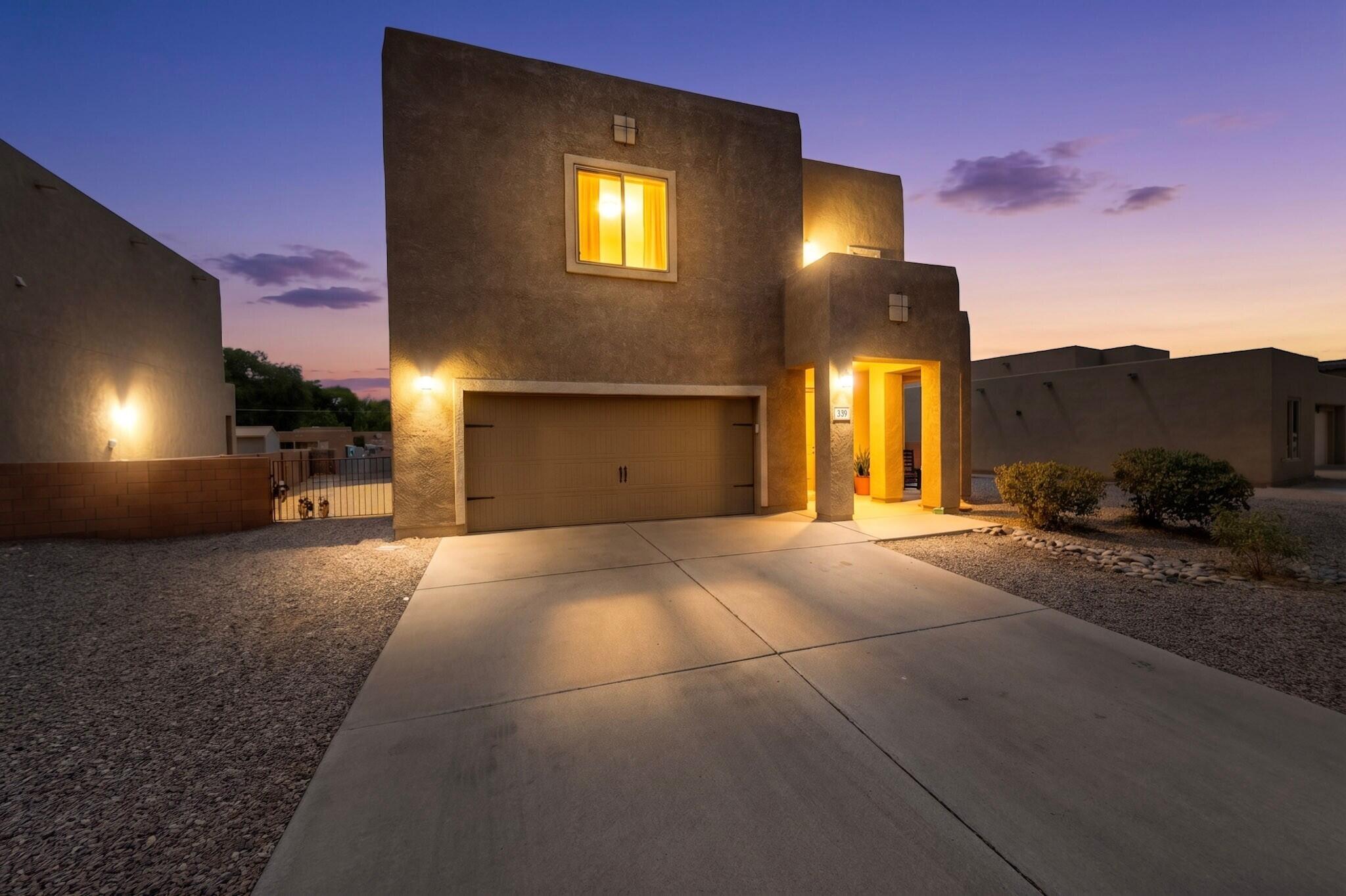 Located in a gated community near the bosque in Southwest Albuquerque, this beautiful home offers 4 bedrooms 3 bathrooms and almost 2100 sqft of living space. On the main floor you have an open concept living area open to the kitchen and dining area. Perfect for entertaining! The kitchen features granite countertops, stainless steel appliances and an island. Upstairs you have a spacious primary suite with a garden tub and separate shower, double vanity and walk in closet.  Additionally, there are 3 spacious bedrooms and full bathroom. Schedule your showing today to see this home in person and fall in love!