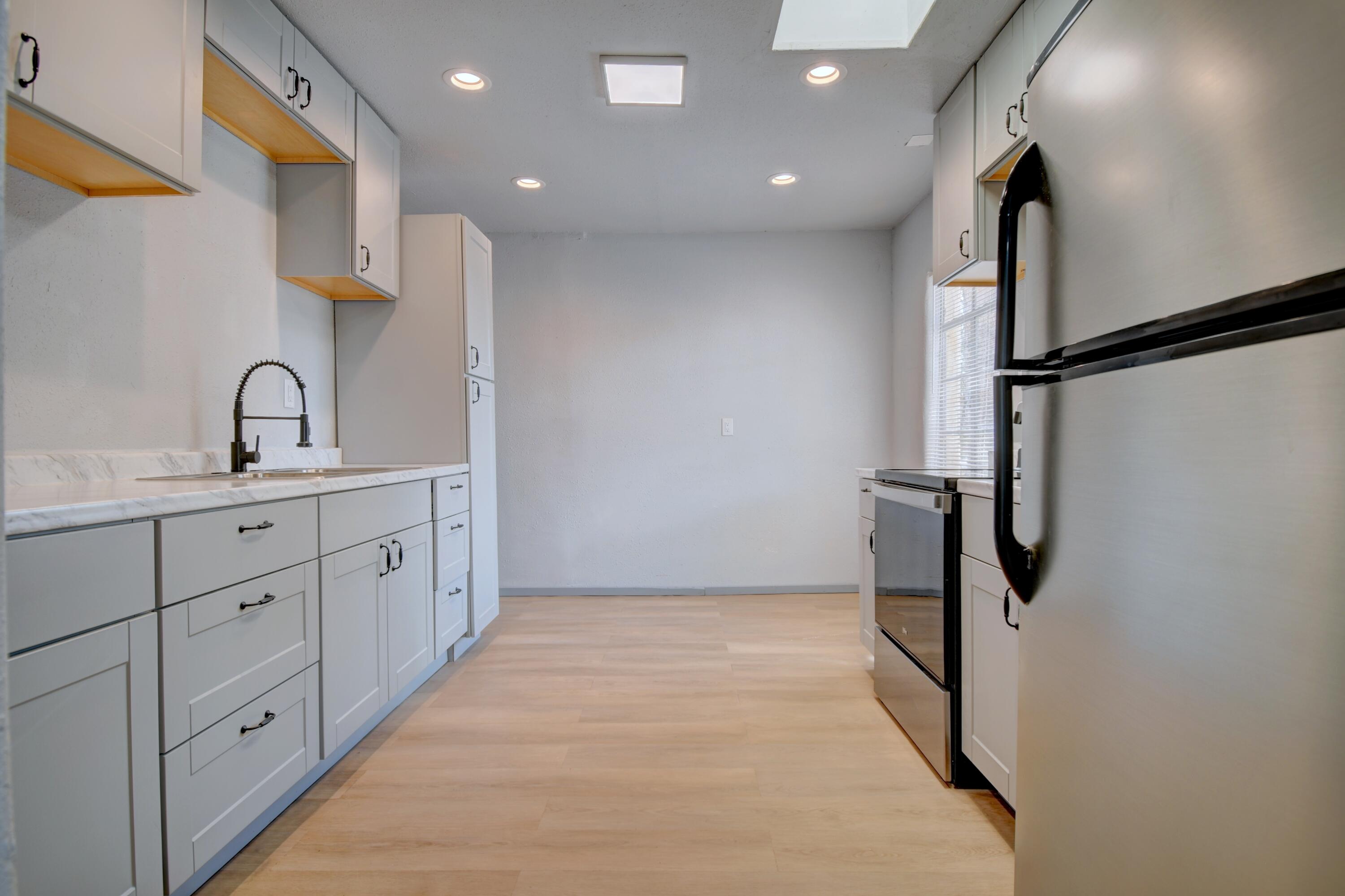 Photo 3 of Single family home for sale at 2708 Monroe St NE, Albuquerque, NM 87110 | MLS# 1107872 | Listing updated on 2026-09-15