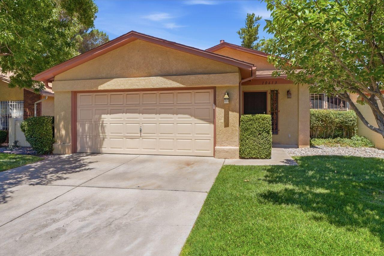 Welcome to Towne Park, a wonderful mature well kept gated community. This home is a one of a kind, you will love the open and bright floorplan offered by this property. It is 1152 SQF, which includes 3 bedroom, 2bath, 2 car attached garage. Beautiful flooring throughout,, upgraded counter tops, large living area, wood burning fireplace, skylights and vaulted ceilings. Both bathrooms updated. Very pleasant backyard for your green thumb with a  covered patio, you'll enjoy entertaining your guests in this peaceful serene backyard. Lots of updates by the Seller, new roof 2022, new windows, added refrigerated air/heatunit, new water heater, replace all original flooring with beautiful tile and laminate throughtout. Land is owned! The community includes 2 large parks, 2 swimming pools, walking trails and clubhouse which is available for personal use, gym and library.