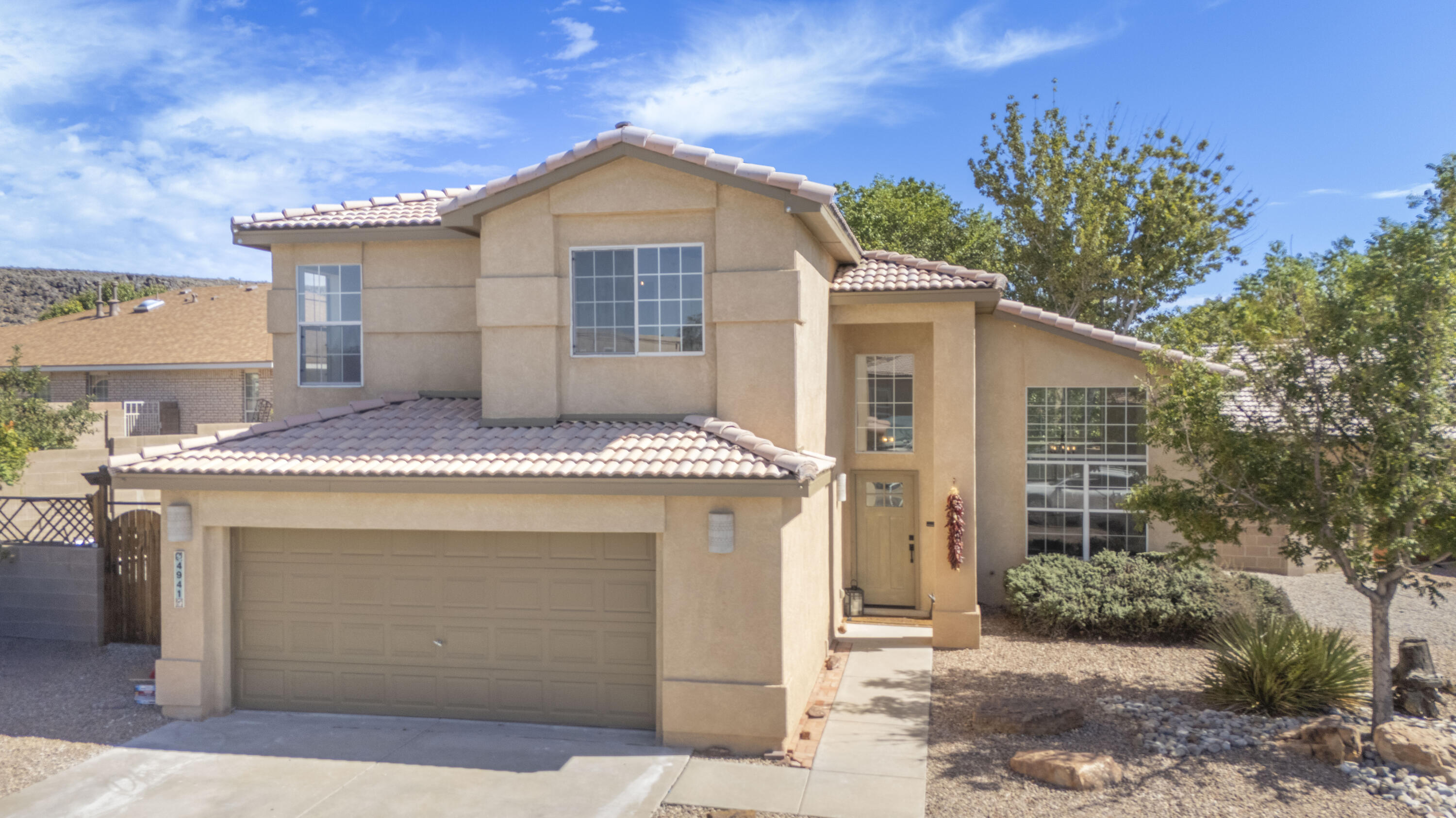 Please contact listing agent for more information.Welcome to this beautifully remodeled home nestled in a wonderful pocket near the Petroglyphs, offering easy access to scenic walking trails and some of the Westside's most desirable amenities. Located just down the street from Paseo del Norte and Golf Course, this home offers exceptional convenience with easy access to anywhere in the city. Thoughtfully remodeled from top to bottom, this home features a completely updated kitchen with all new appliances, beautifully renovated bathrooms, fresh paint, new fixtures and quality finished throughout. The cozy and inviting family room provides a comfortable space to relax and gather, while the separate living and dining area features soaring ceilings and an open spacious feel, perfect for entertaining. One of the standout features is the exceptional tile workmanship throughout the home, showcasing beautiful layouts and attention to detail that truly set this property apart. The front and back yard feature great, low-maintenance xeriscaping, creating inviting outdoor spaces that are both attractive and easy to maintain. A convenient doggie door leads directly to a large dog run, making this home especially appealing to pet owners. With no HOA, you'll also enjoy added flexibility including a large side area ideal for an RV, boat, additional vehicles, or other recreational equipment.  With its combination of craftsmanship, modern updates, desirable location, and proximity to the Petroglyphs, this home is truly move-in ready and ready for its new owners.