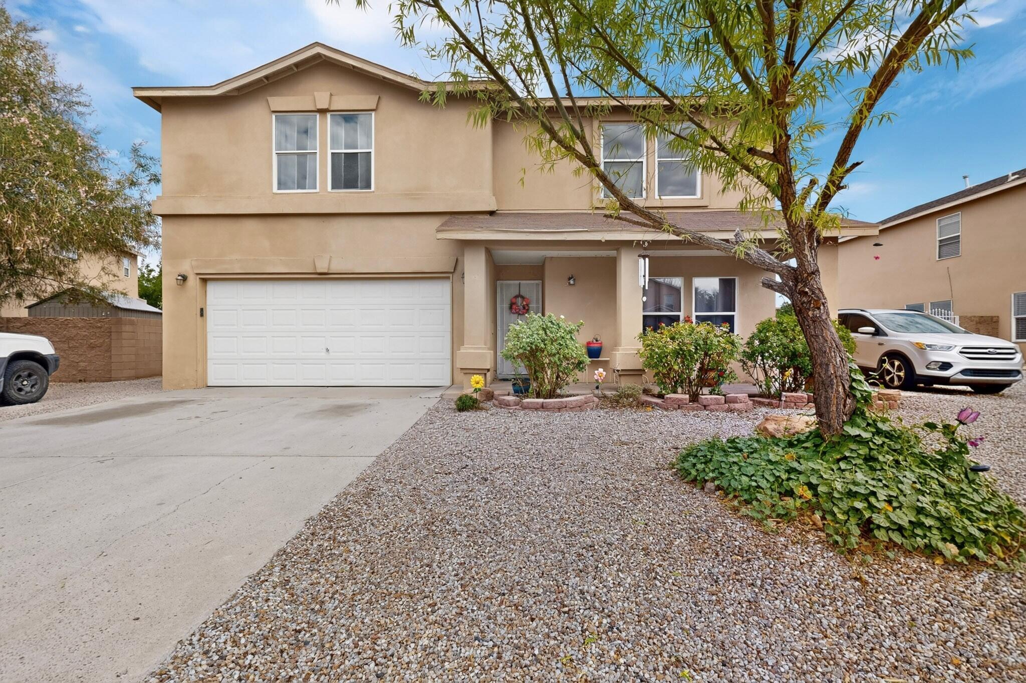 This home is nestled in a quiet North Valley neighborhood and features four spacious bedrooms plus a versatile loft area. The downstairs offers two generous living spaces and a large kitchen, providing plenty of room for entertaining and everyday living.