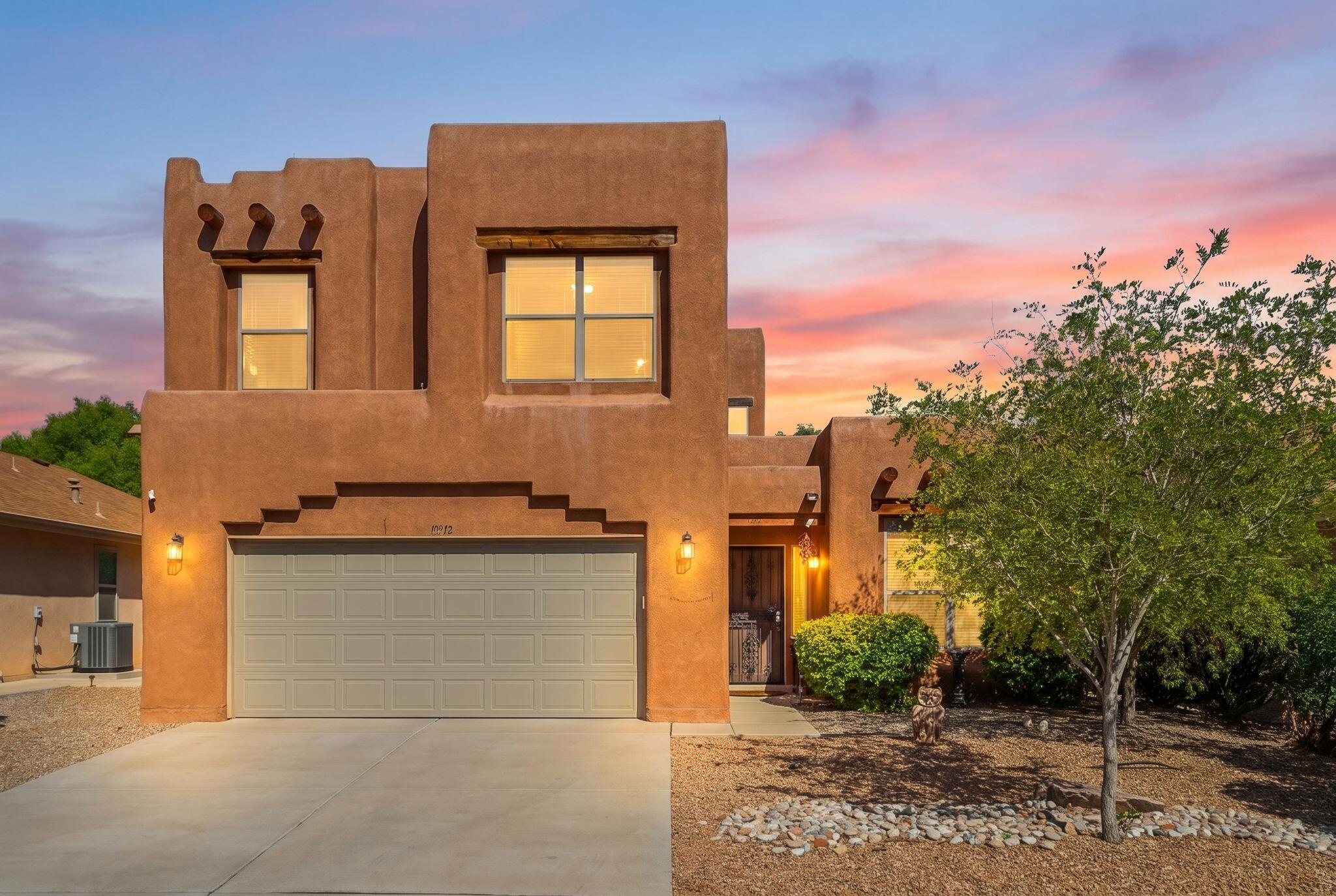 Welcome to 10512 Rosefinch NW! This beautifully updated 3-bedroom, 3-bathroom home offers approximately 2,133 square feet of comfortable, modern living with thoughtful upgrades throughout. The main level features attractive ceramic tile flooring with a wood-look finish, while the upstairs offers durable vinyl flooring--no carpet anywhere in the home! The updated kitchen showcases stainless steel appliances and opens to the living areas for easy everyday living and entertaining. Retreat to the spacious primary suite featuring an updated bathroom with a custom-tiled shower and stylish finishes. Additional highlights include tile base along the flooring for a clean, finished look and well-maintained living spaces throughout. Move-in ready and tastefully updated, this home combines comfort, style, and functionality in a great Albuquerque location!