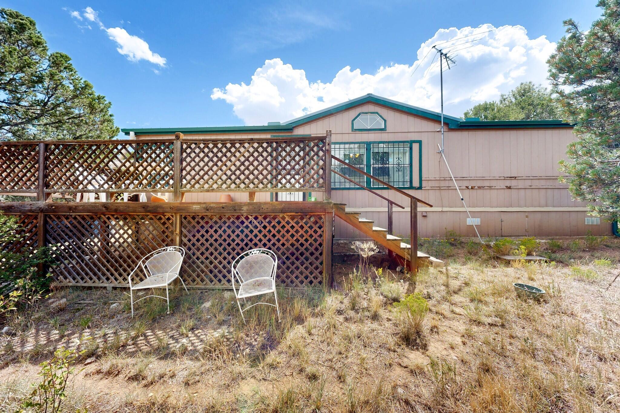 Photo 35 of Manufactured home for sale at 13 Calle Del Pinon Rd, Sandia Park, NM 87047 | MLS# 1110046 | Listing updated on 2026-09-02