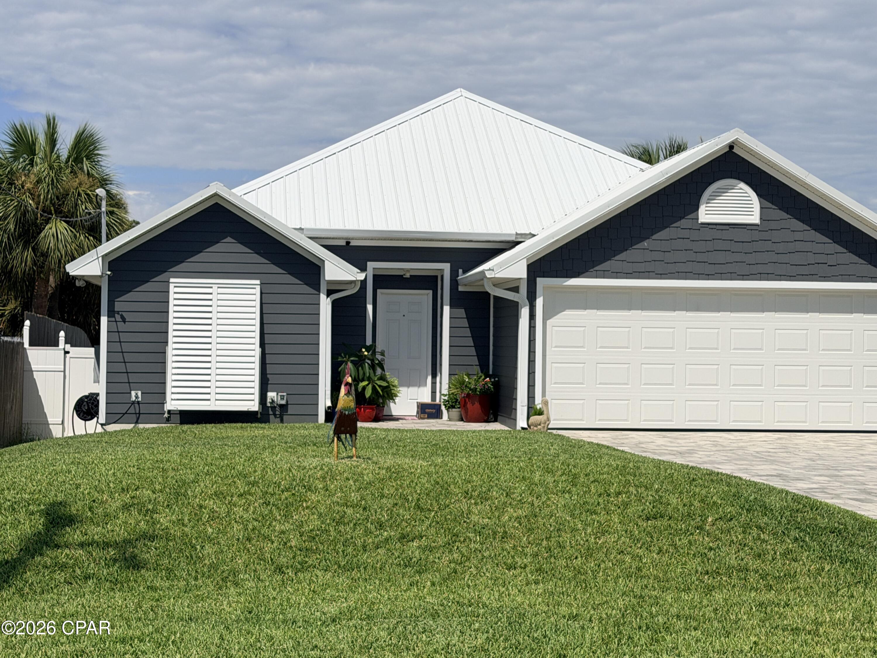 Holiday Beach Unit 15 home at 7308 S Lagoon Drive, Panama City, FL 32408