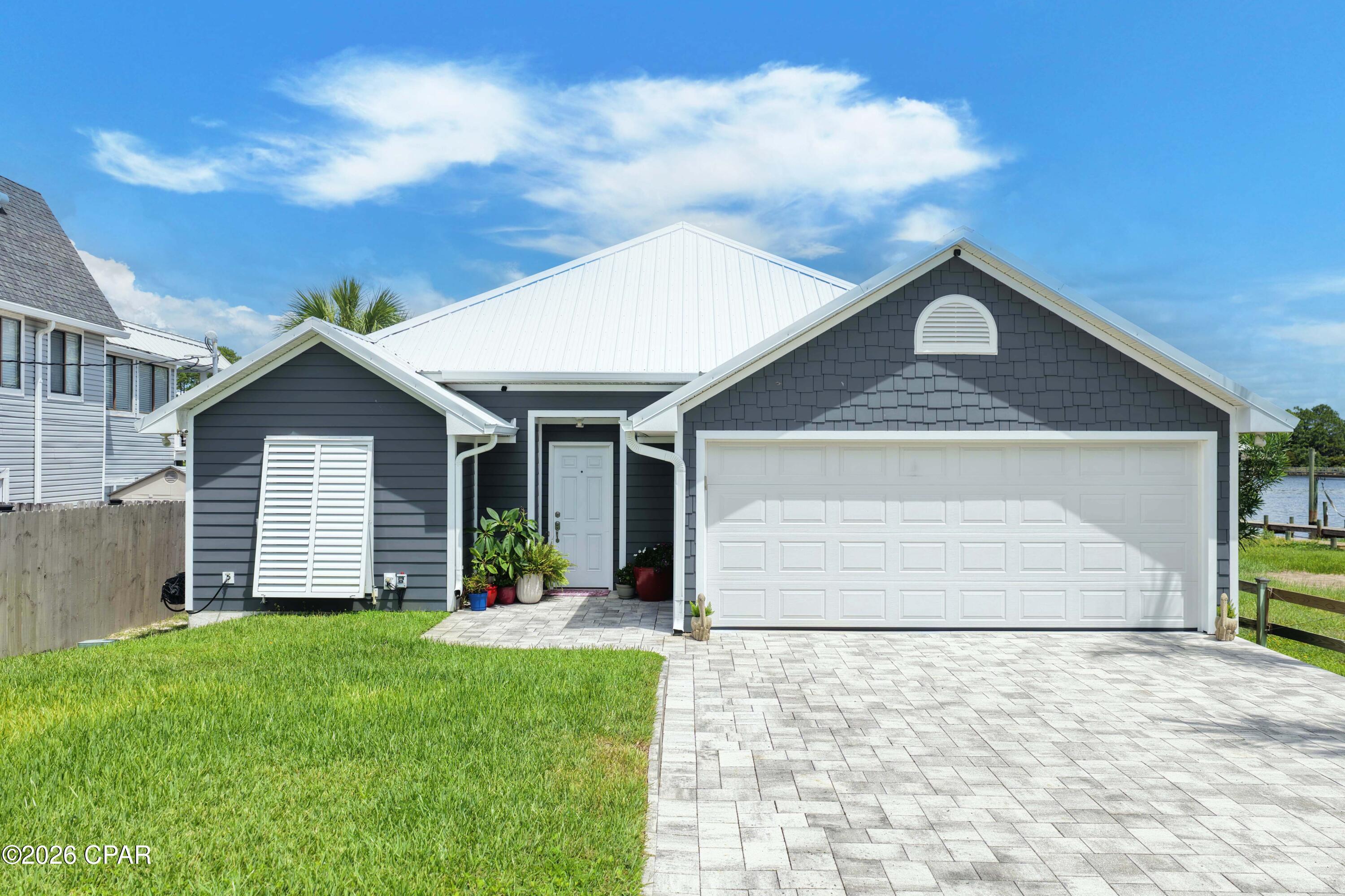 Holiday Beach Unit 15 home at 7308 S Lagoon Drive, Panama City, FL 32408