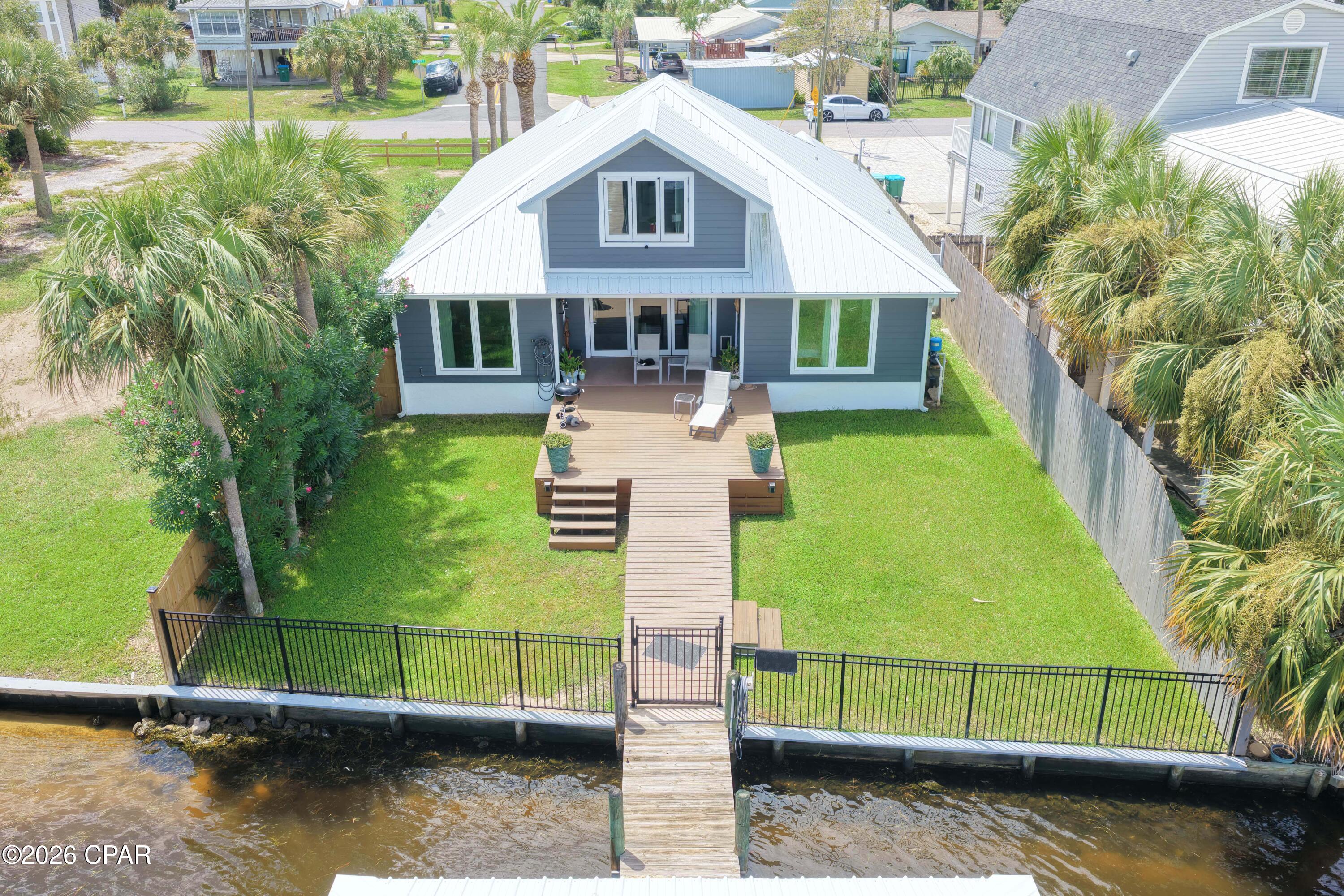 7308 S Lagoon Drive, Panama City, FL 32408 thumbnail, photo 3 of 49