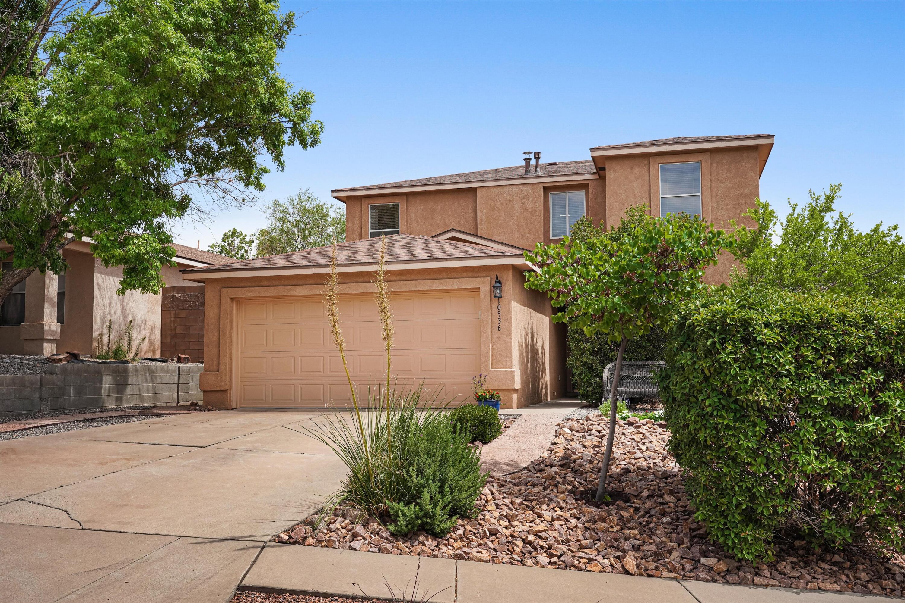 OPEN HOUSE Sunday 2pm-4pm. This great home has the combination that's hard to find--updates galore, an open floor plan, premium oversized lot, private backyard and plenty of room to spread out. The main floor includes a bedroom and full bath, while the upstairs adds another flexible living space with a window seat. The kitchen was updated to open to the dining area and features granite countertops, tile backsplash, abundant cabinetry and under- and over-counter lighting. Oversized California Closets and a large pantry provide great storage. The backyard is awesome, with a large fenced area for play, entertaining or relaxing, plus a separate garden and chicken yard tucked behind the fence. Automatic irrigation makes caring for the landscaping, garden and grass easy, and mature fruit trees include an apple tree grown from seed 15 years ago. The home has been well maintained and thoughtfully improved, including refrigerated air, updated heating, roof replaced in 2019, extra insulation was added in the garage, attic and crawl spaces, updated bathrooms, a full bath on the main floor, refreshed landscaping and walking paths, painted cabinetry in 2024, refreshed backyard landscaping in 2026 and a new insulated garage door in July 2026. The location is hard to beat, with the arroyo, walking and biking trails just a few minutes away and the Cottonwood Mall area plus Rio Rancho shopping, restaurants and services close by. A great floor plan, a fantastic backyard with room to enjoy, and a much loved neighborhood.