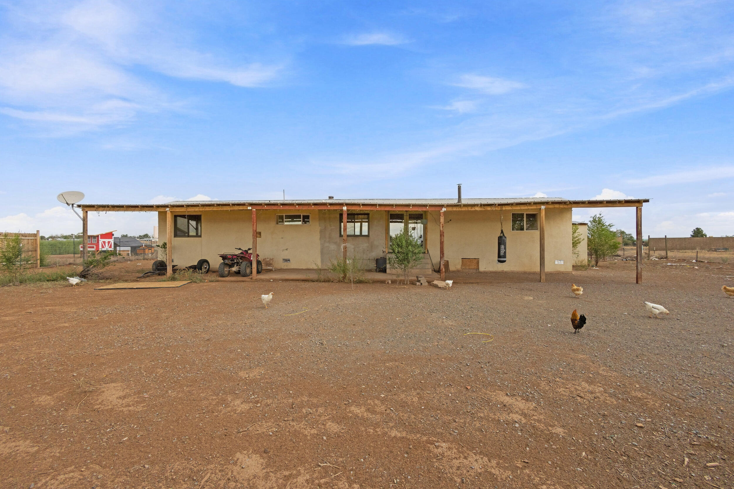 Looking for space, land, and the freedom to create your own little homestead? This approximately one-acre property offers plenty of possibilities! The property includes an older 1984 single-wide manufactured home and an existing outbuilding suitable for feed storage and housing small animals. The fenced acreage provides room for chickens, gardening, pets, or other small-animal uses, subject to applicable regulations. This property offers an opportunity for a buyer willing to bring some vision and improvements to an affordable acreage setting. Come explore the possibilities and make this one-acre property your own!