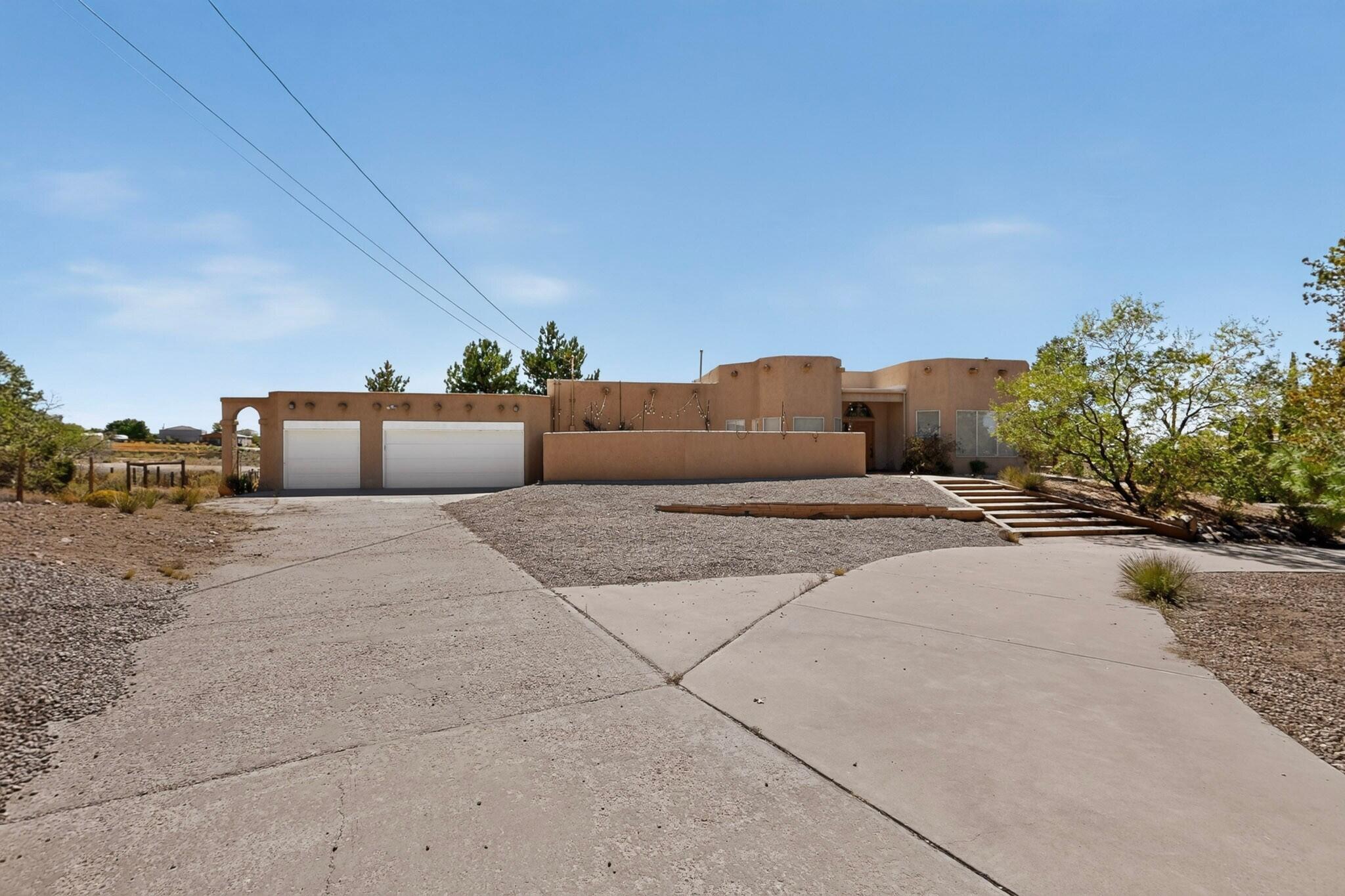 Photo 2 of Single family home for sale at 12050 Holly Ave NE, Albuquerque, NM 87122 | MLS# 1110479 | Listing updated on 2026-09-12