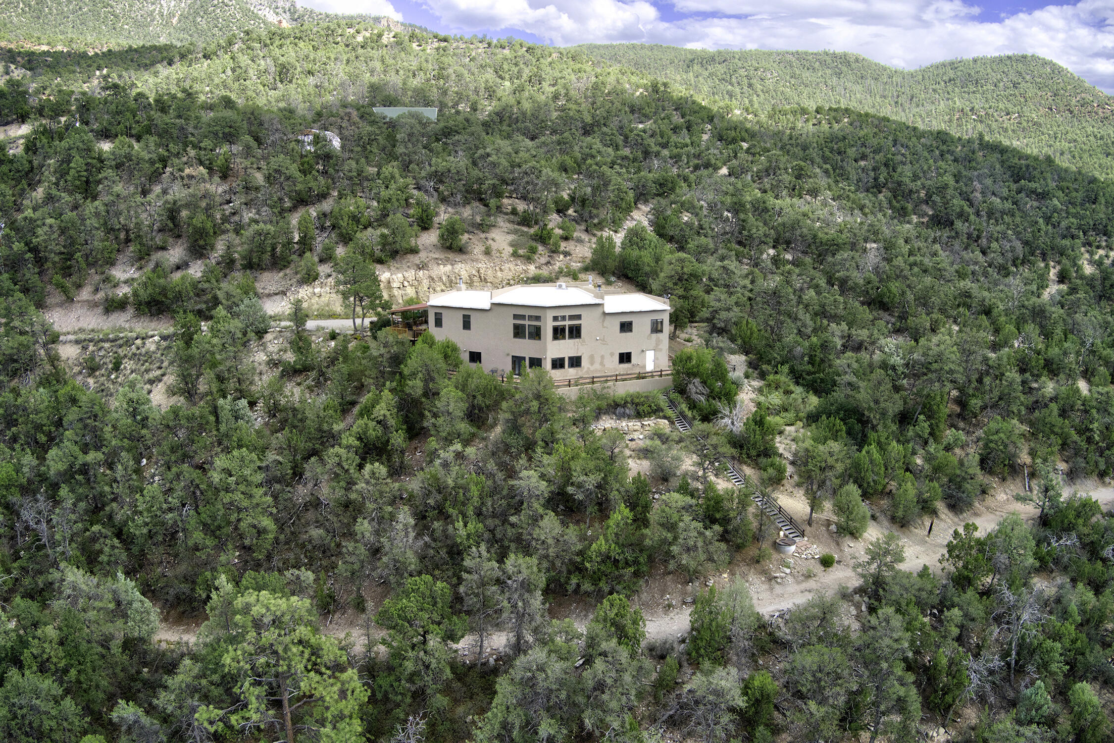 Photo 2 of Single family home for sale at 73 Indian Mesa Trl, Jemez Springs, NM 87025 | MLS# 1110548 | Listing updated on 2026-09-07