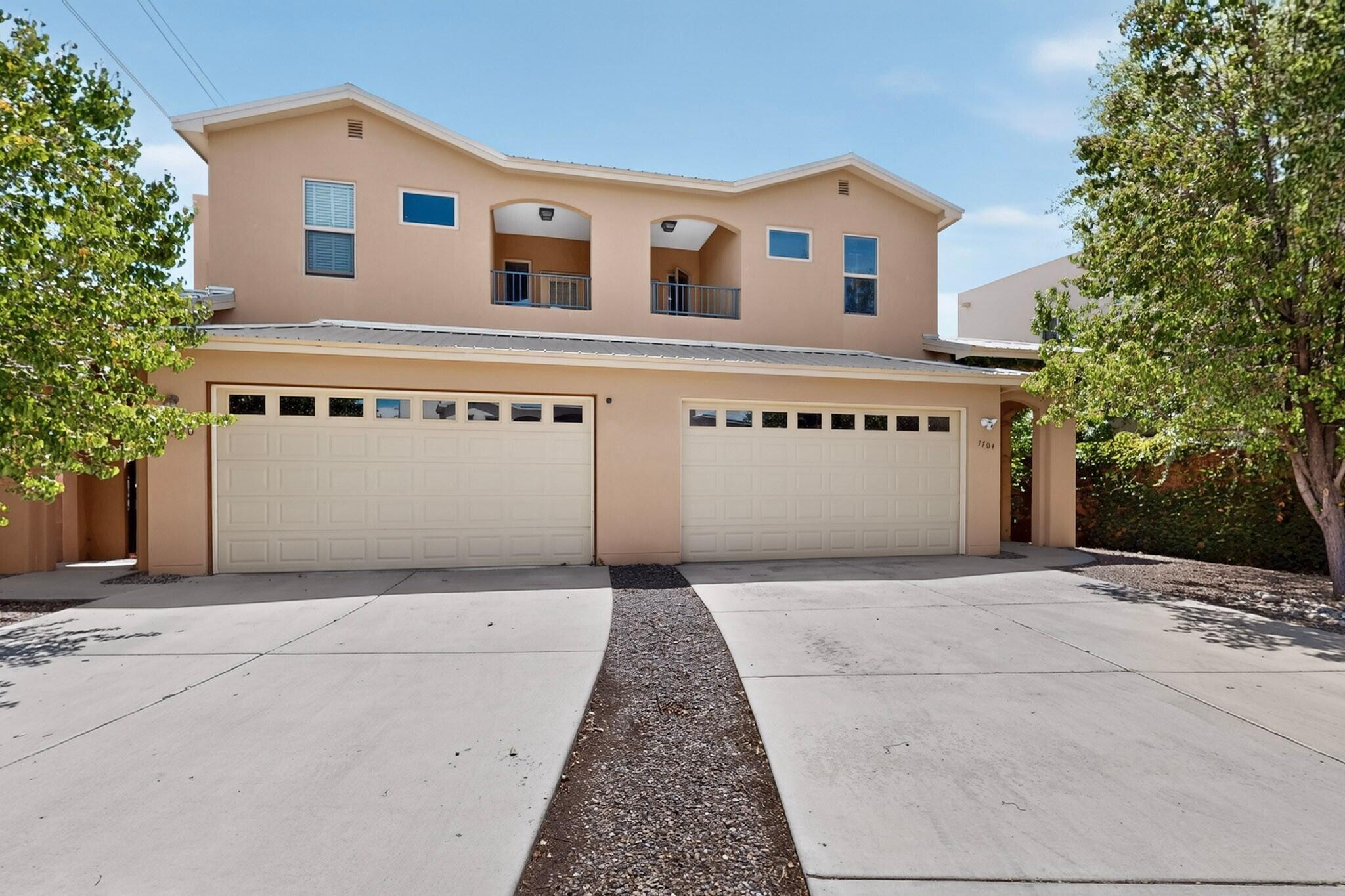 Photo 2 of Townhouse for sale at 1704 Band Saw Pl Nw, Albuquerque, NM 87104 | MLS# 1110755 | Listing updated on 2026-09-12