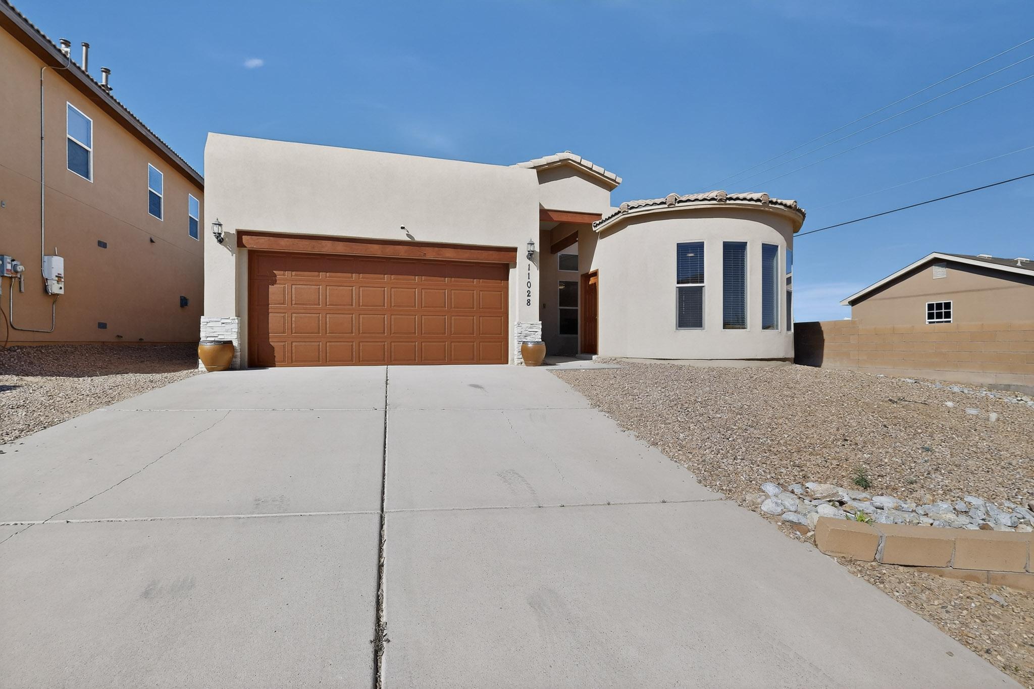 Photo 2 of Single family home for sale at 11028 Maravillas Dr Nw, Albuquerque, NM 87114 | MLS# 1110847 | Listing updated on 2026-09-11