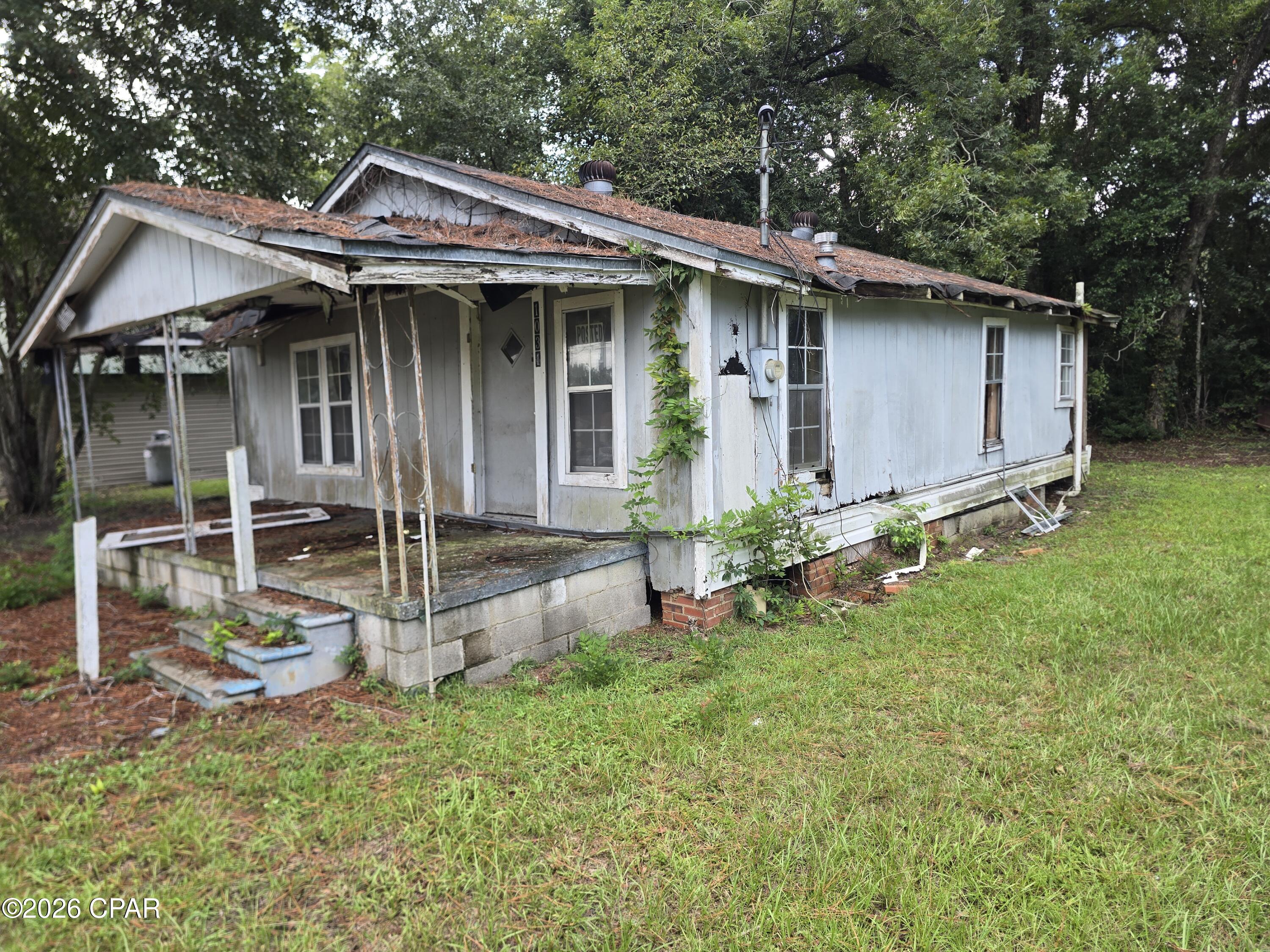 Photo 2 of Single family home for sale at 1031 Washington Ave, Graceville, FL 32440 | MLS# 795332 | Listing updated on 2026-10-14