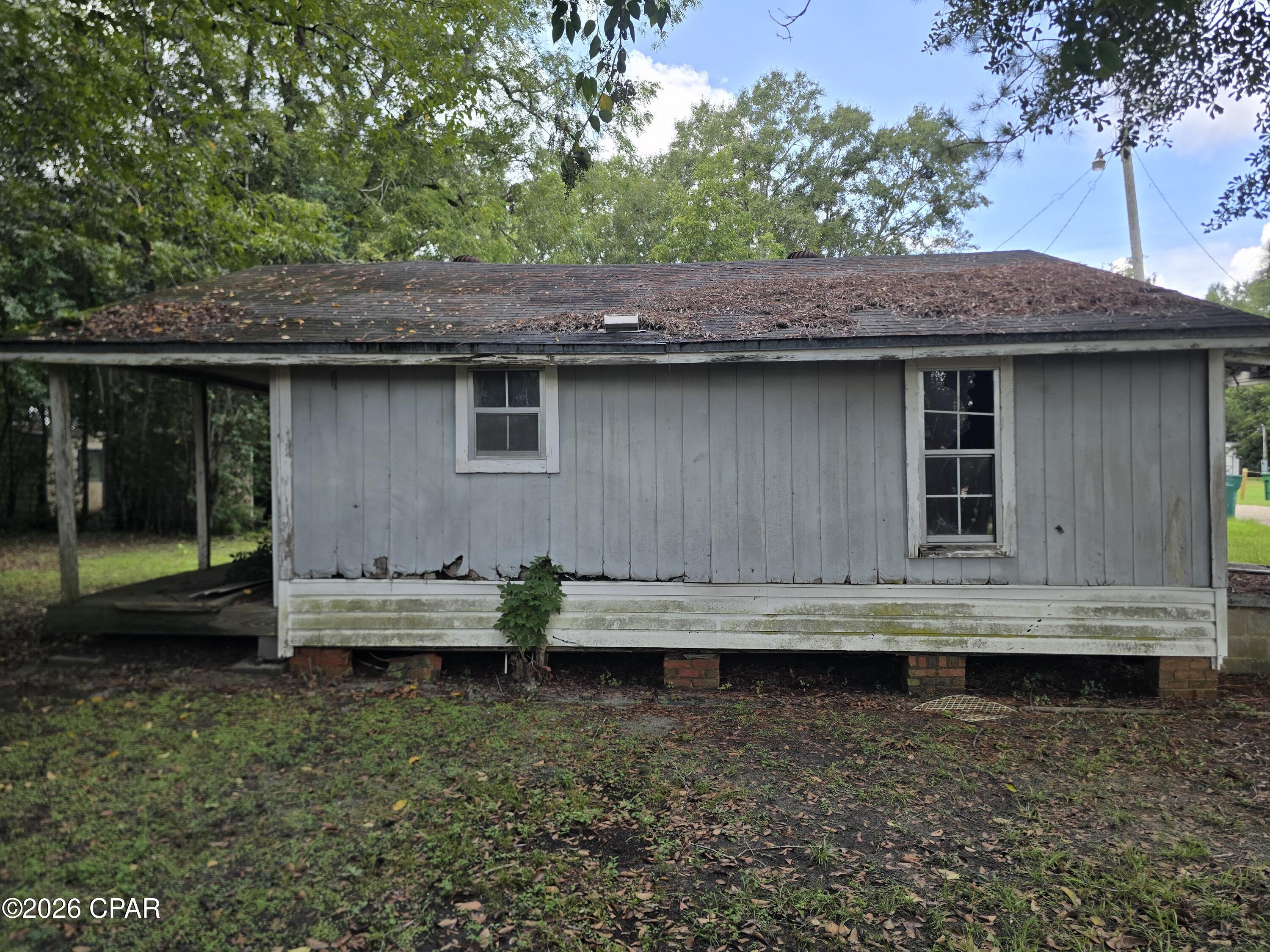 Photo 3 of Single family home for sale at 1031 Washington Ave, Graceville, FL 32440 | MLS# 795332 | Listing updated on 2026-10-14