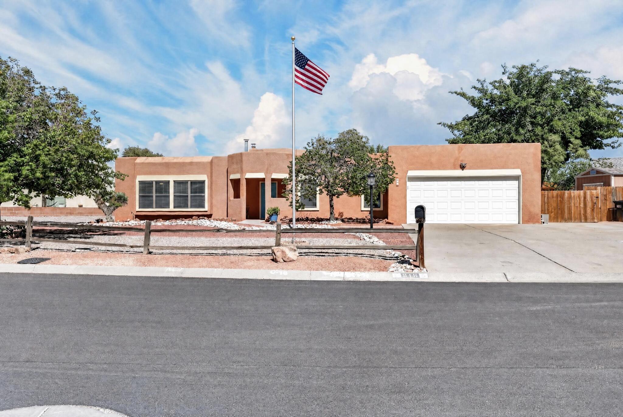 Meticulously cared for in Rio Rancho boasting backyard access with RV Pad and electrical hook up. Multiple living areas. Primary bath remodeled 2026. Water heater replaced in 2025, Master cool replaced 2 years ago. Gas stove w/convection oven & built in air fryer replaced 2026. Solar to paid off at closing by Seller. Roof replaced 2 years ago and recently serviced by roofer.  Large John Deere safe in back bedroom closet conveys. French drain attached to downspouts and grading was re-done for optimal drainage. Stucco touched up in 2026 and wood trim painted. Garage door opener replaced 4 years ago. Irrigation controller was replaced 5 years ago. This home feels so spacious but also cozy at the same time! Beautiful built in glass cabinet in dining room. Large laundry room and pantry. Movable kitchen island that conveys. The low maintenance backyard offers many areas to sit and enjoy the outdoors. With backyard access and a large shed! Spacious driveway would fit many cars or toys. Pride of ownership really shows in this home!