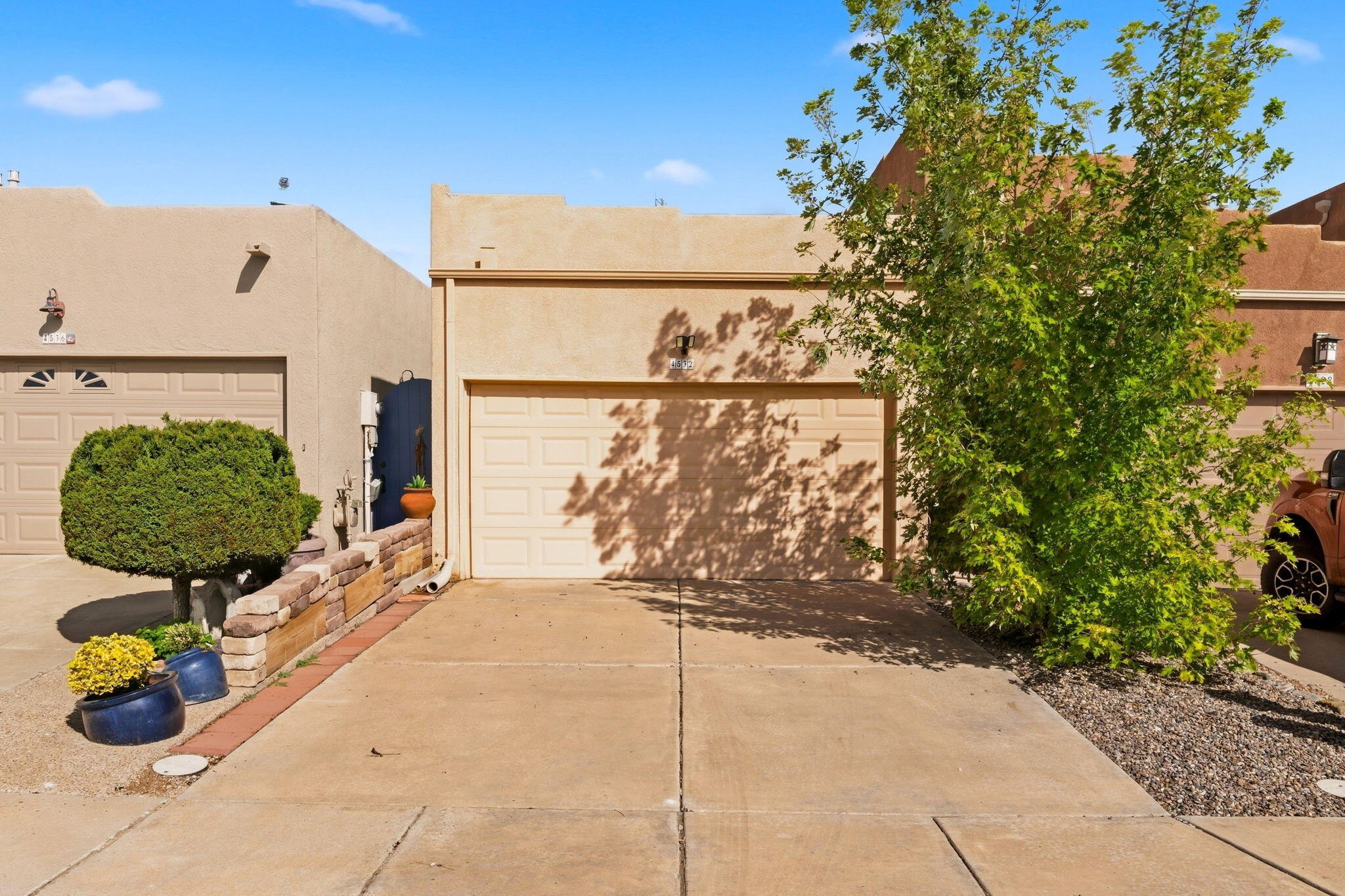 Easy, comfortable living with NO HOA!  This well-kept 2-bedroom, 2-bath townhome offers 1,089 square feet of thoughtfully designed, single-level living in a small townhome community - with the added benefit of ADA-accessible features throughout.  Inside, the open kitchen connects easily to the living area, creating a comfortable central space for everyday living and entertaining.  A gas fireplace adds warmth and character to the living room, while the cozy breakfast nook offers the perfect spot for morning coffee.  Both bedrooms and baths are conveniently located on one level, with a floor plan designed for accessibility and ease of movement.  An attached 2-car garage provides plenty of room for parking and storage - an especially nice bonus in a home with such an easy-to-manage footprint.  The home is in good overall condition, offering enough space to live comfortably without spending your weekends taking care of more house than you need.  And with no HOA, there's no monthly association fee adding to the cost of ownership.  The location makes everyday life easy, too, with shopping, dining and a great Starbucks within walking distance.   Competitively priced with the market in mind, this is a terrific opportunity for buyers looking for an accessible, low-maintenance home that's ready for its next owner.  One level, two bedrooms, two baths, a gas fireplace, 2-car garage, no HOA and a location that puts plenty within easy reach - come take a look!