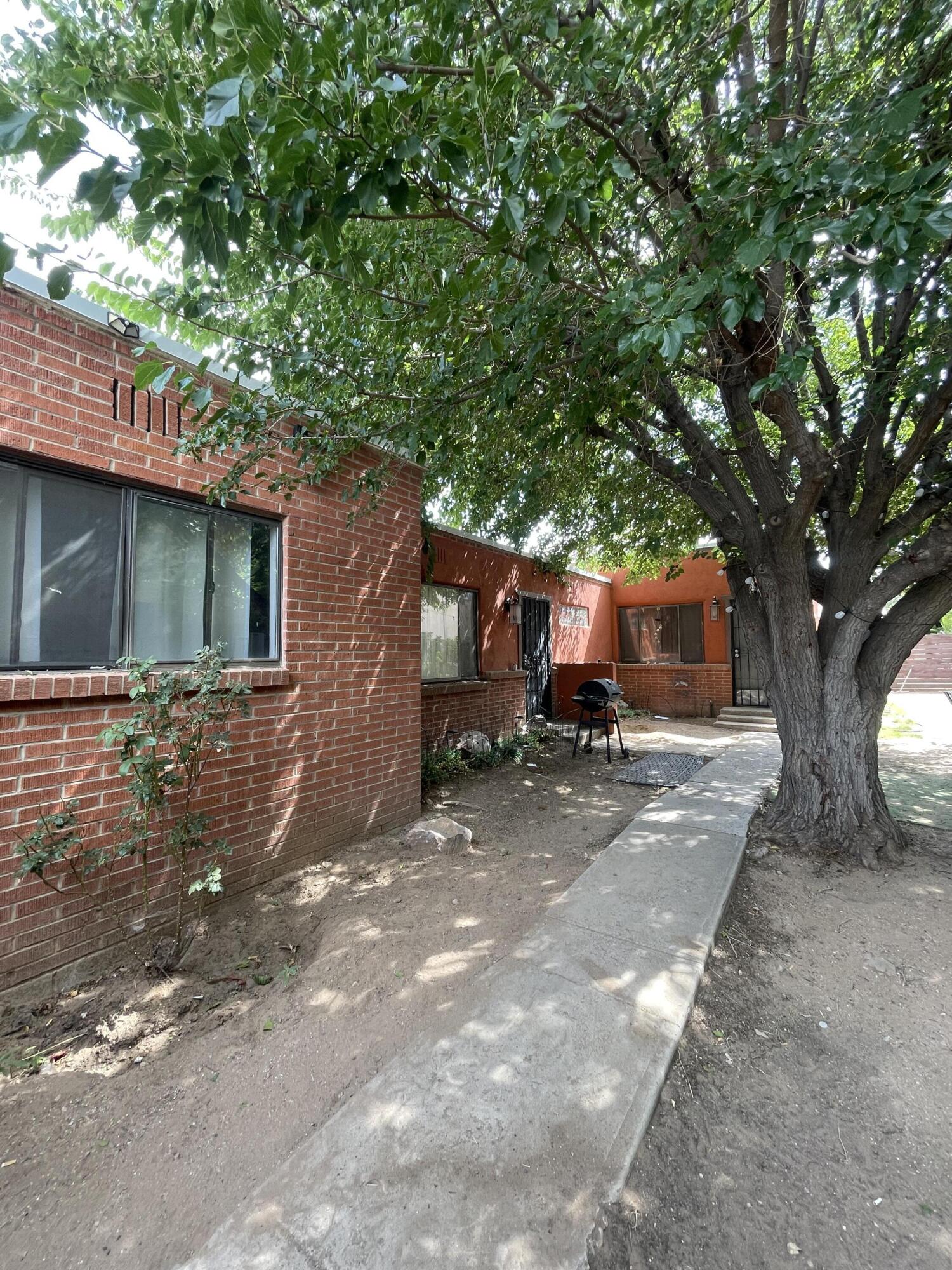 Photo 4 of Multi family home for sale at 304 Texas St NE, Albuquerque, NM 87108 | MLS# 1111342 | Listing updated on 2026-09-29