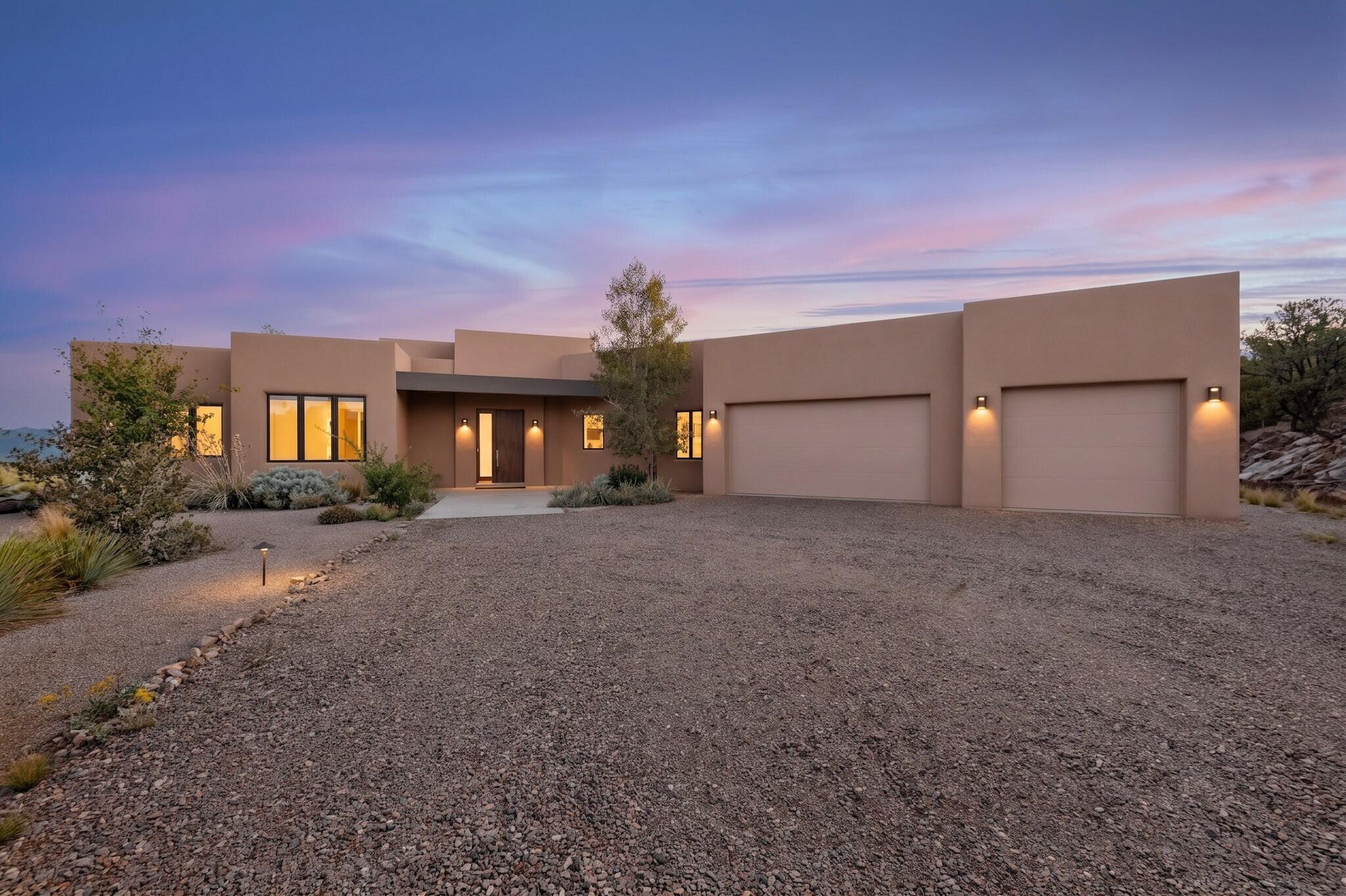 One Story Custom Beauty built by Crombie Construction on a quiet Cul-de-Sac, IncredibleViews/Open Space East of the Home in the Highly Desirable Paa-Ko Community. Gorgeous Kitchen, Large Island w/ Seating, Stainless Steel Appliances, Granite, Open to the Dining Room, Great Room, Tall Ceilings, Exposed Beams, Tongue & Groove Ceilings, and a Cozy River Rock Gas Fireplace. Lots of NATURAL LIGHT, REFRIGERATED AIR, Large Master Suite w/ Dual Sinks and a Huge Walk In Closet, Skip Trowel Wall Finish, Bullnose Corners, Beautiful Tile Throughout NO CARPET, Custom Wood Cabinets, Soft Close Doors and Drawers, Tongue and Groove Patio Soffits, Gas Stub out for your Outdoor Kitchen, Tankless Water Heater and Gemline Water Conditioning System, Large 3 Car Garage, Lots of Storage ''MOVE IN READY''