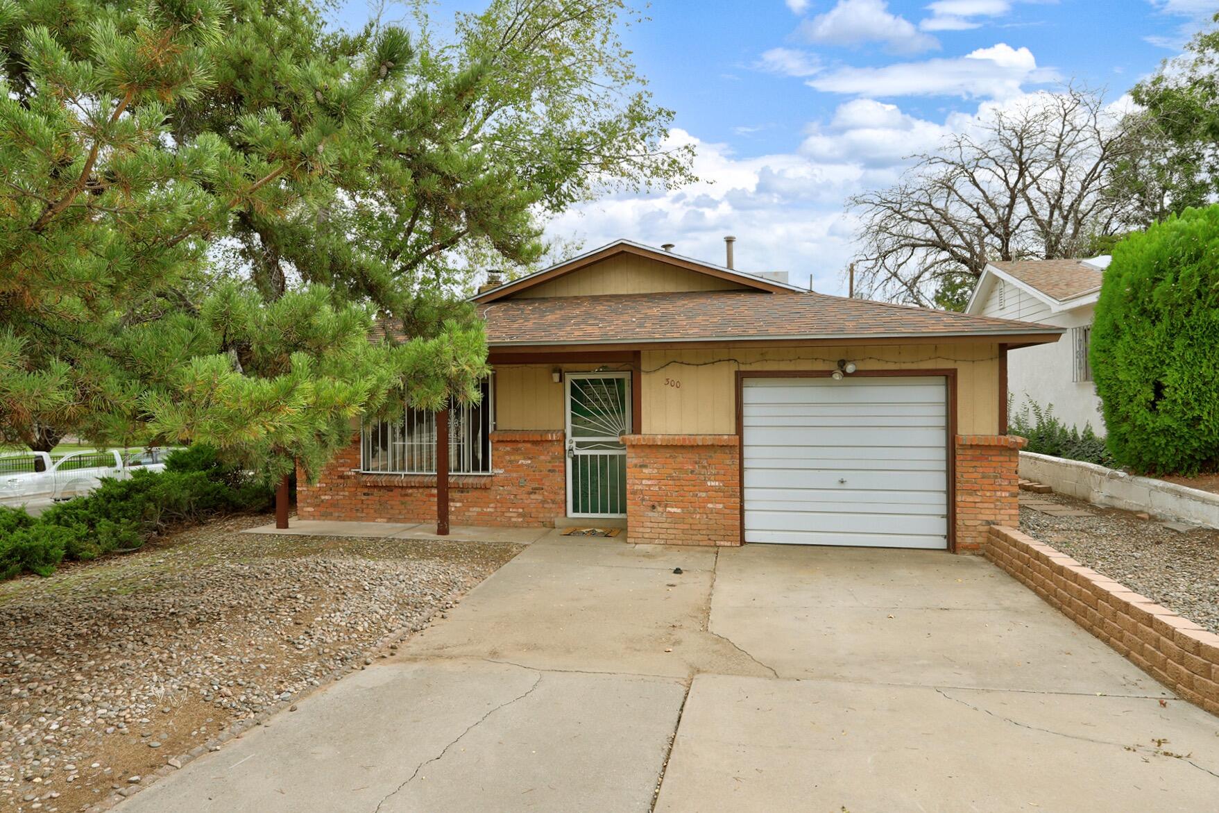 Single family home for sale at 300 Aliso Dr SE, Albuquerque, NM 87108 | MLS# 1111813