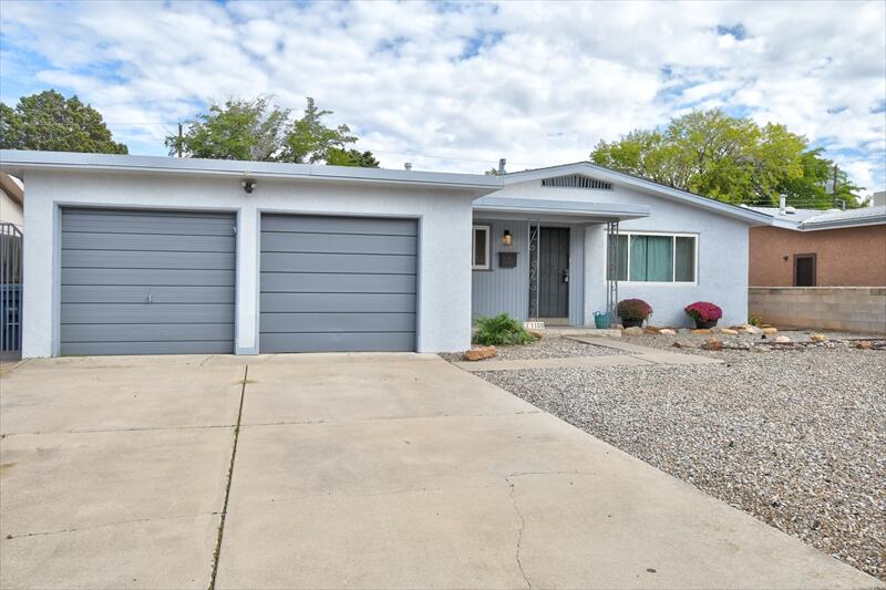 Welcome to this beautifully updated 3-bedroom, 2-bathroom single-story home that blends comfort, character, and modern convenience. Multiple upgrades throughout create a move-in-ready feel, starting with warm hardwood flooring that flows through much of the home.The heart of the house is the inviting great room, anchored by a huge wood-burning fireplace--perfect for cozy evenings and gatherings. The updated kitchen features sleek stainless steel appliances and is ready for everyday cooking or entertaining. A convenient laundry room and a one-and-a-half-car garage add practical everyday ease.Set on a large lot, this home offers room to relax, garden, or play outdoors while enjoying the privacy and space of a single-level layout. Ideal for those seeking low-maintenance living with classic charm and modern updates.